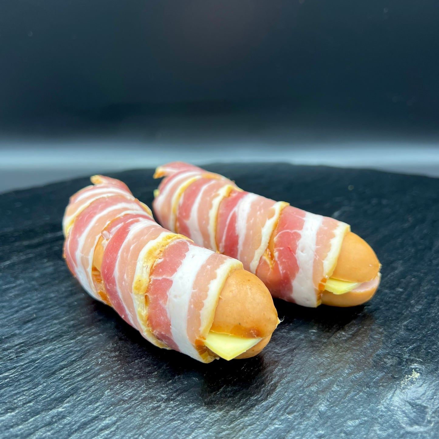 Allgäuerle - Das Würstchen mit Emmentaler und Bacon umwickelt