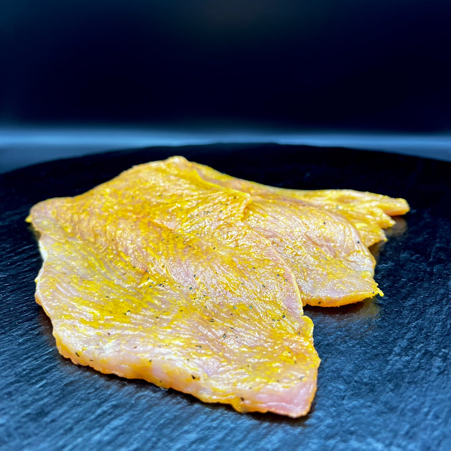 mariniertes Putensteak frisch vom Metzger